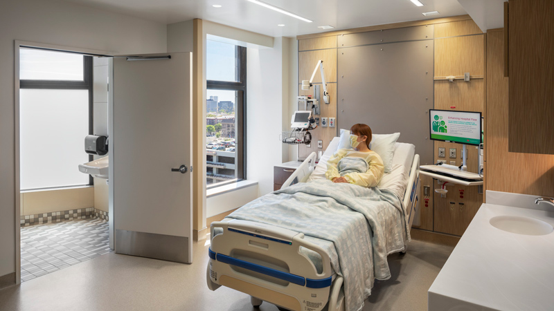 patient in a hospital room looking out the window