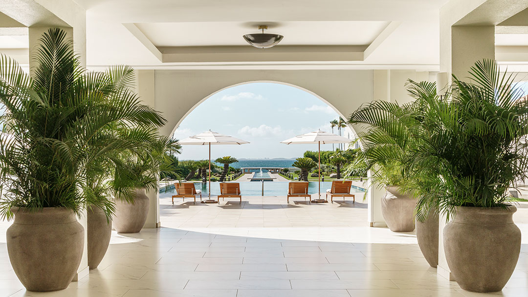 view to ocean through archway